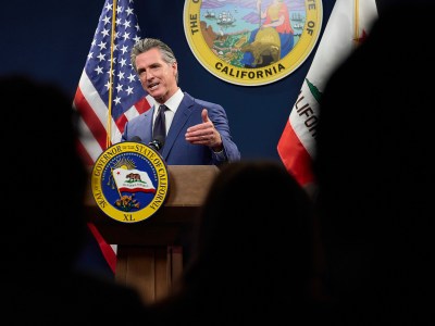 Gov. Gavin Newsom addresses the media during a press conference unveiling his revised 2024-25 budget proposal at the Capitol Annex Swing Space in Sacramento on May 10, 2024. Photo by Fred Greaves for CalMatters